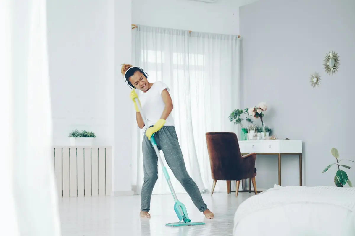 A cleaner cleaning a home